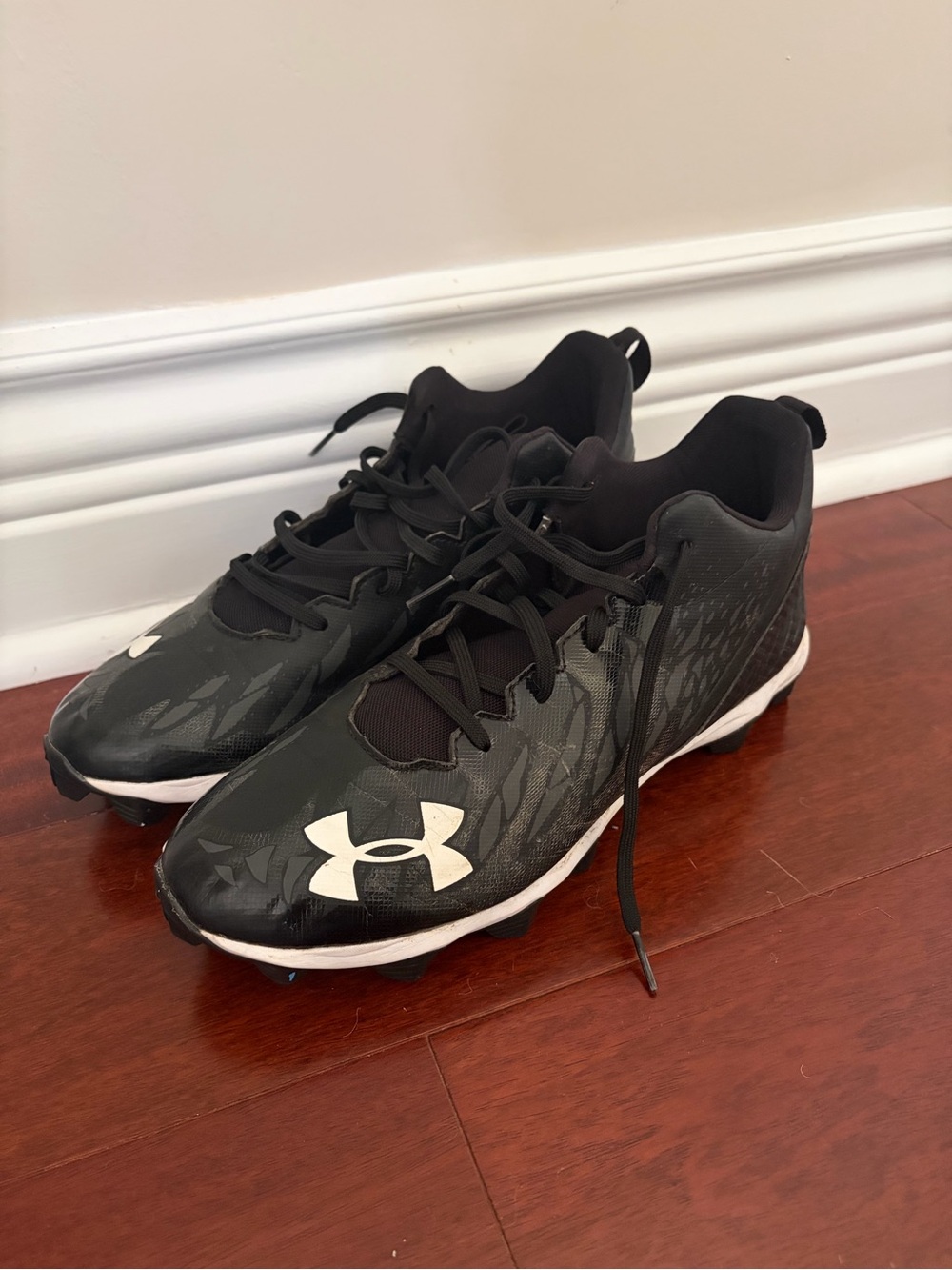 Under Armour Men’s Black and White Athletic Cleats